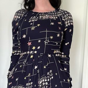 Soft Emily and Fin dress with fun multi-colored star pattern